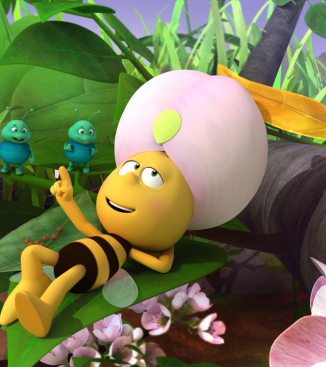 Willi, König der Blattläuse lässt sich von den Blattläusen wie ein König verwöhnen. Er liegt mit erhobenen Finger auf einem Blatt und gibt Anweisungen.