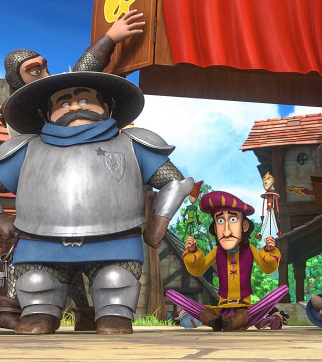 Die Wachen des Sheriffs heben die Puppenbühne in die Höhe. Darunter sitzt mit zwei Puppen der Puppenspieler am Boden. Der Sheriff schaut zufrieden zu.