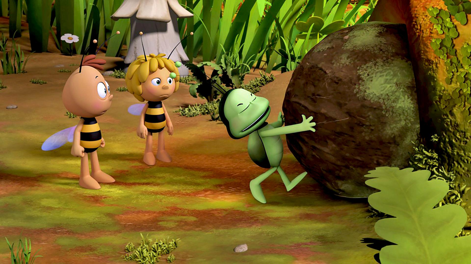 Flip und Maja bewundern Ballis Mistkugel, an die sich Balli klammert.