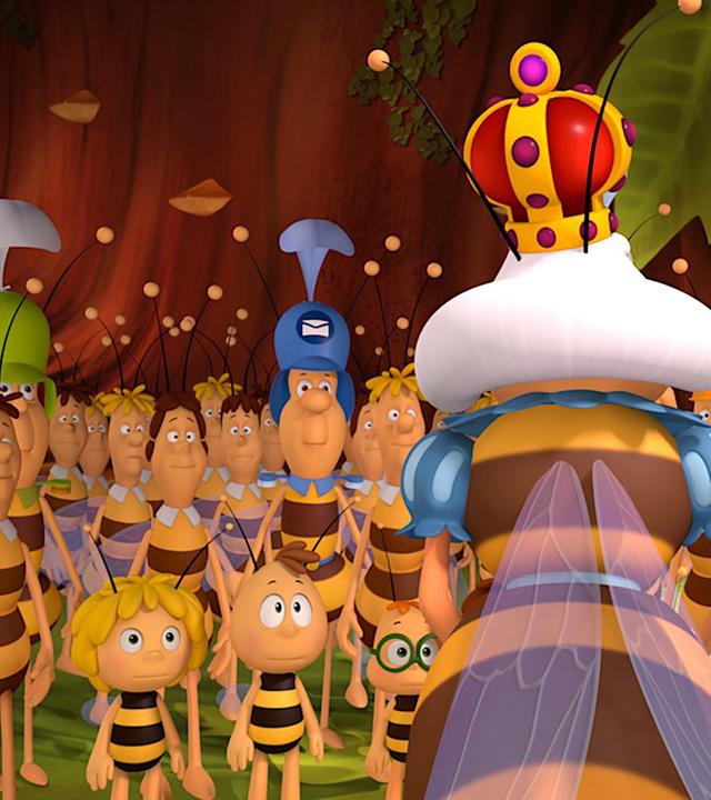 Die Bienenkönigin steht vor ihrem Volk.