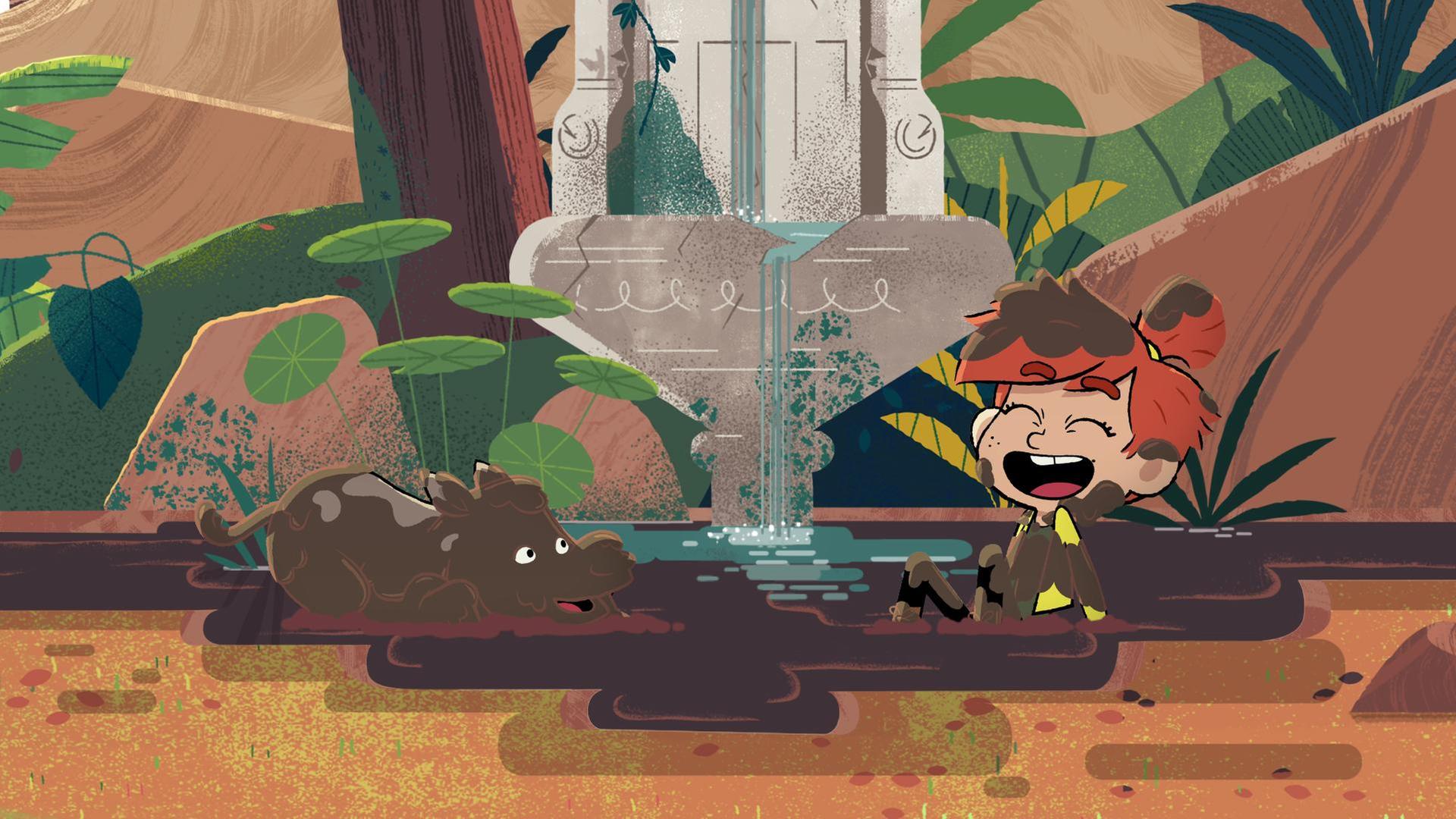 Taylor sitzt lachelnd mit dem Nashorn-Baby in einer Schlammpfütze. Die beiden sind voll mit Schlamm.