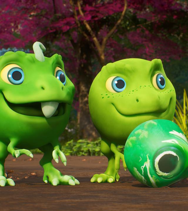 Die drei grünen Erbs-Rexe Minzi, Split und Wasabi stehen vor einem kleinen Jade-Spielstein und schauen ihn begehrlich an. Denn alle wollen mit ihm spielen.