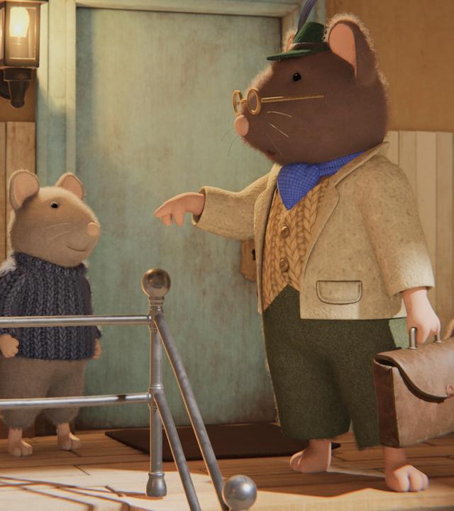 Herr Grummel steht im Treppenhaus des Mäusehauses vor zwei Wohnungstüren, vor ihm stehen Sam und Julia. Herr Grummel steht dicht vor den Stufen, die hinabführen, und deutet mit dem Zeigefinger seiner rechten Hand auf Sam.