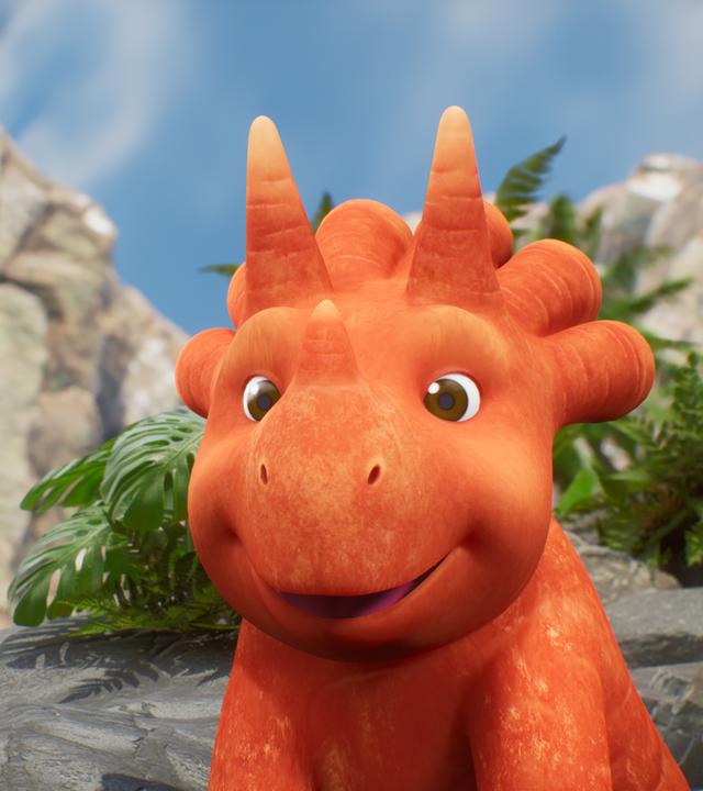 Das Trikarottops-Mädchen Ginger sieht aus wie eine Karotte mit Gesicht und einem Schwanz aus Karottengrün. Sie freut sich über eine Pause.