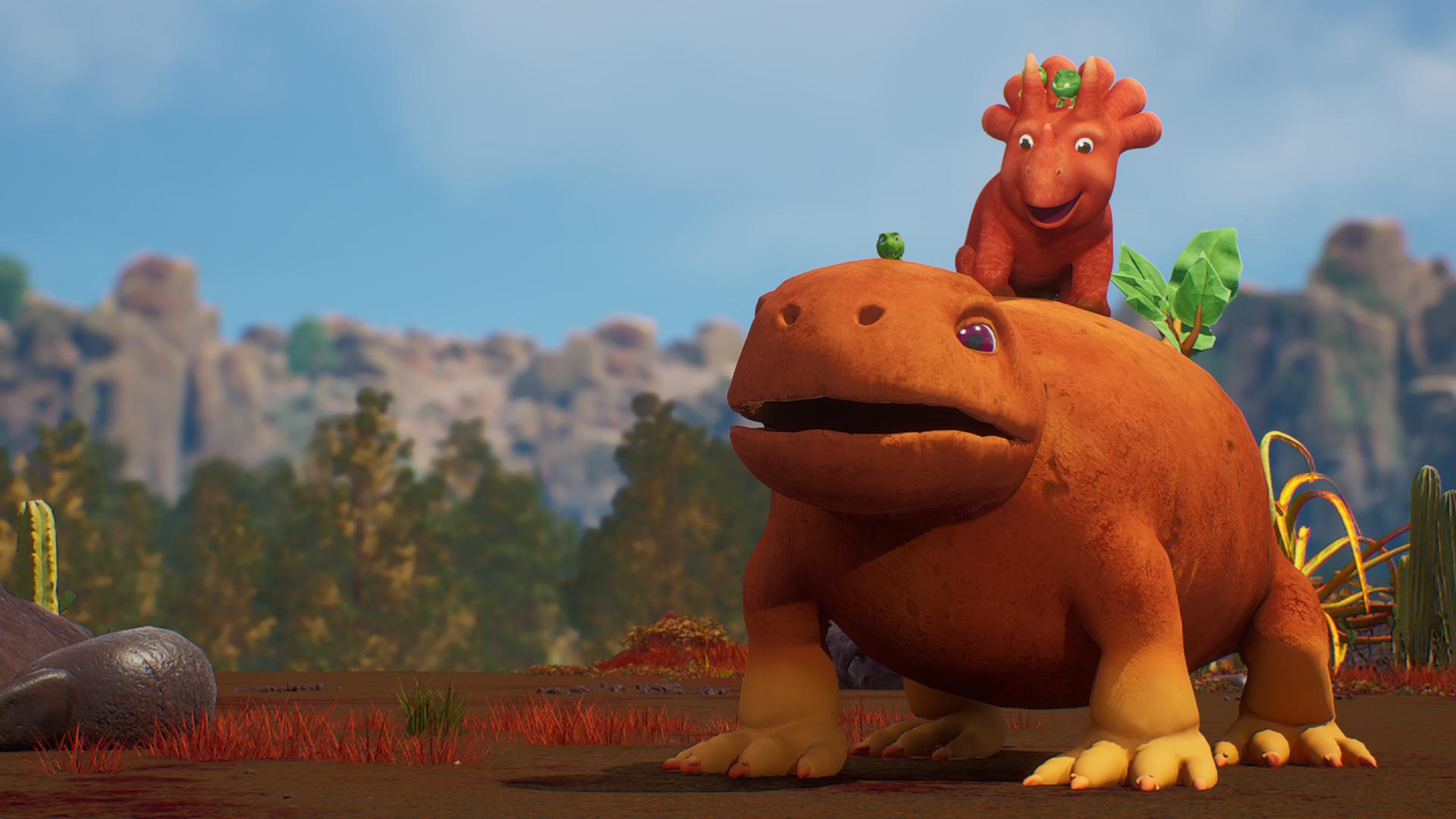 Ein orange-braunes Süßkartofflodon trägt auf dem Rücken die lachende Ginger, ein Trikarottops-Mädchen. Sie spielen zusammen in einer felsigen Landschaft mit Kakteen. 