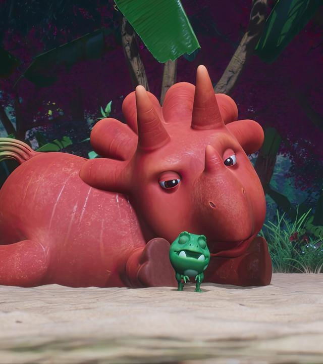 Ginger, das orangefarbene Trikarottops-Mädchen, hat alle Viere von sich gestreckt und schaut müde auf einen der Erbs-Rexe.