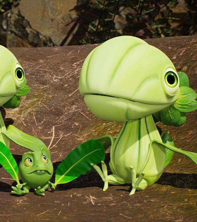 In einem großen Nest sitzen zwei Pakchoidactylus-Babys, die gespannt nach oben schauen. Zwischen den beiden Dinoküken, die wie Pakchoi aussehen, sitzt der kleine, grüne Erbs-Rex Minzi. In seinen Händen hält er zwei Blätter, die er als Flügel benutzt hat.