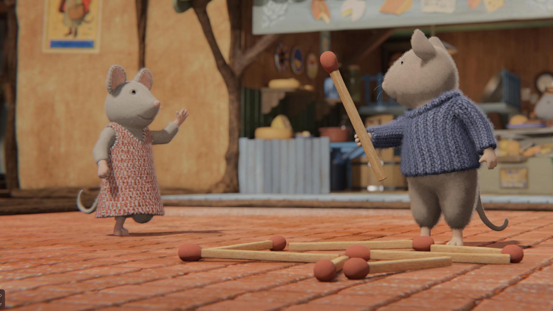 Sam und Julia stehen im Hof des Mäusehauses vor dem Käseladen. Sam hat ein großes Streichholz in der rechten Hand und schaut fragend zu Julia. Julia scheint ihm die Anweisung zu geben, wohin er das Streichholz zu den bereits auf dem Boden liegenden Streichhölzern legen soll.  Dort scheint aus den Hölzern ein Grundriss eines Gebäudes zu entstehen.