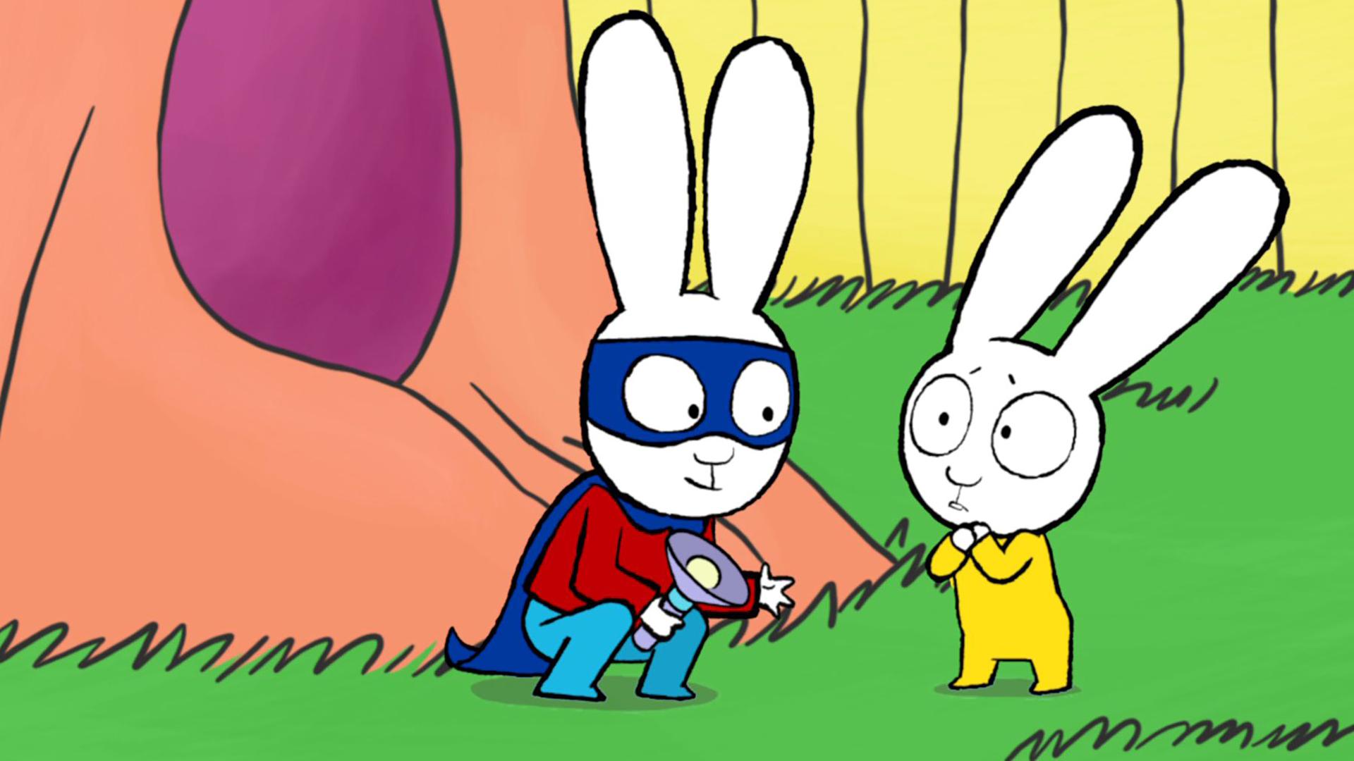 Draußen im Garten: Simon, mit blauem Cape und Augenmaske als Superhase verkleidet, hockt mit einer Taschenlampe in seiner rechten Hand vor seinem kleinen Bruder Franz. Franz schaut verängstigt zu Simon herüber, der ihm die linke Hand vertrauensvoll entgegenstreckt.