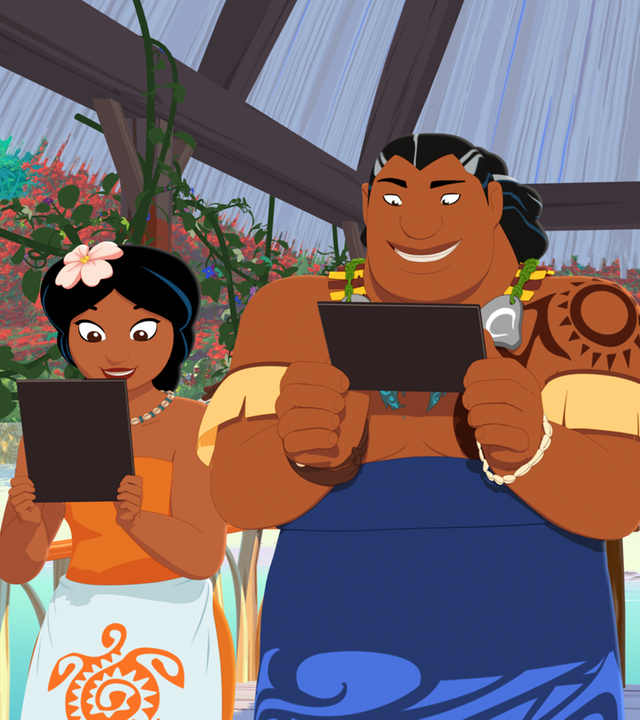 Zwei Dorfbewohner halten ihre geschenkten Tablets und interessieren sich für nichts anderes mehr. Yann schaut sich das verärgert an.