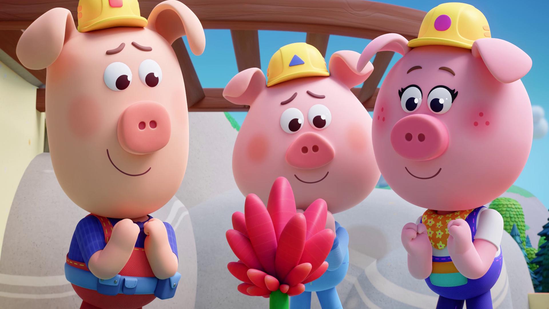 Drei Schweinchen mit Latzhosen und Bauarbeiter-Helmen - die so genannten Werkel-Ferkel - stehen um eine kleine, pinkfarbene Blume herum, und bewundern sie von allen Seiten. Sie sind ganz angetan von der Schönheit der Blume.