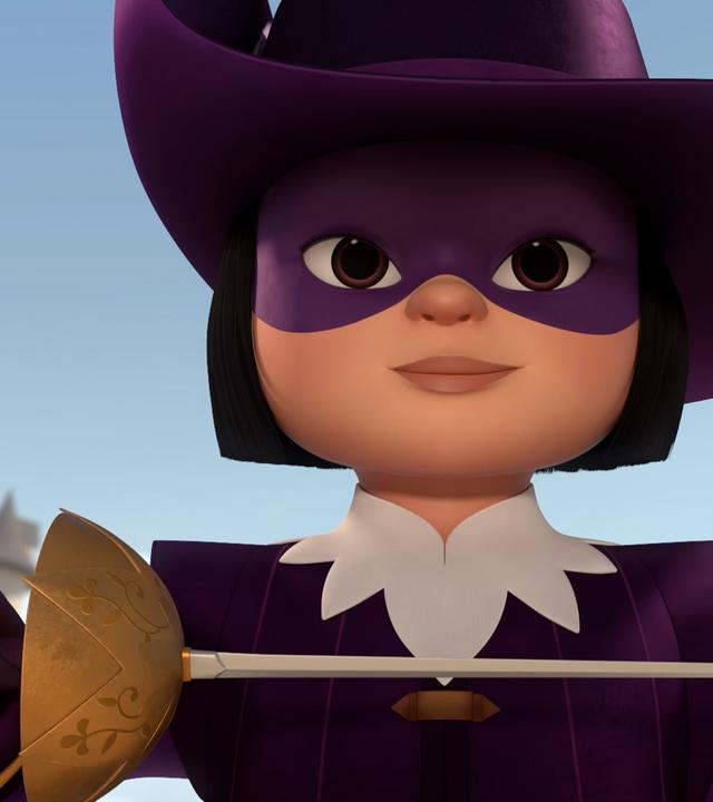 Nahaufnahme, Untersicht: Porthos hält mit stolzem und lächelndem Blick ihren Degen in beiden Händen waagrecht vor sich. Über ihr ist der blaue Himmel zu sehen.