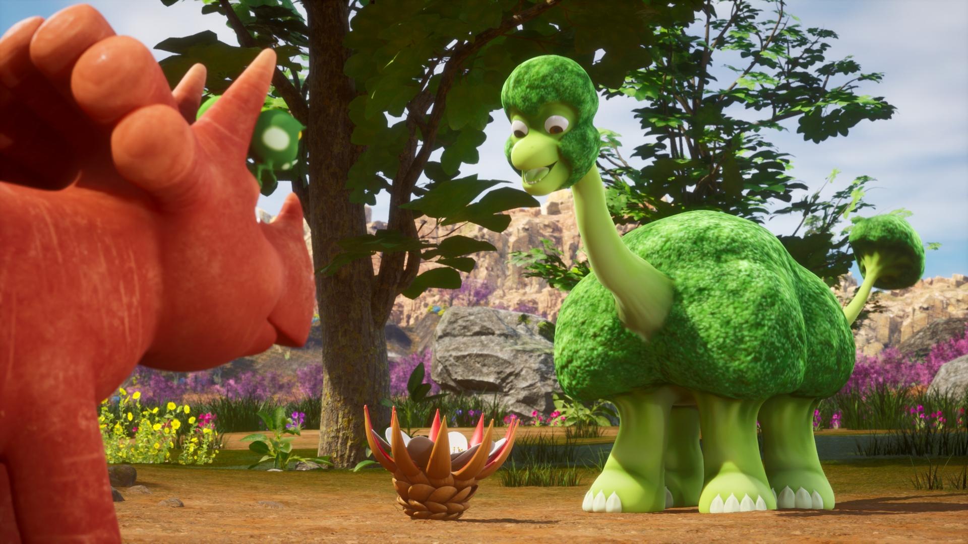 Ein kleiner, grüner Brokkoli-Saurier schaut freudig auf den Boden. Ginger, das Trikarottops-Mädchen, steht vor ihm und schaut ebenfalls zum Boden, wo eine große Blüte liegt.