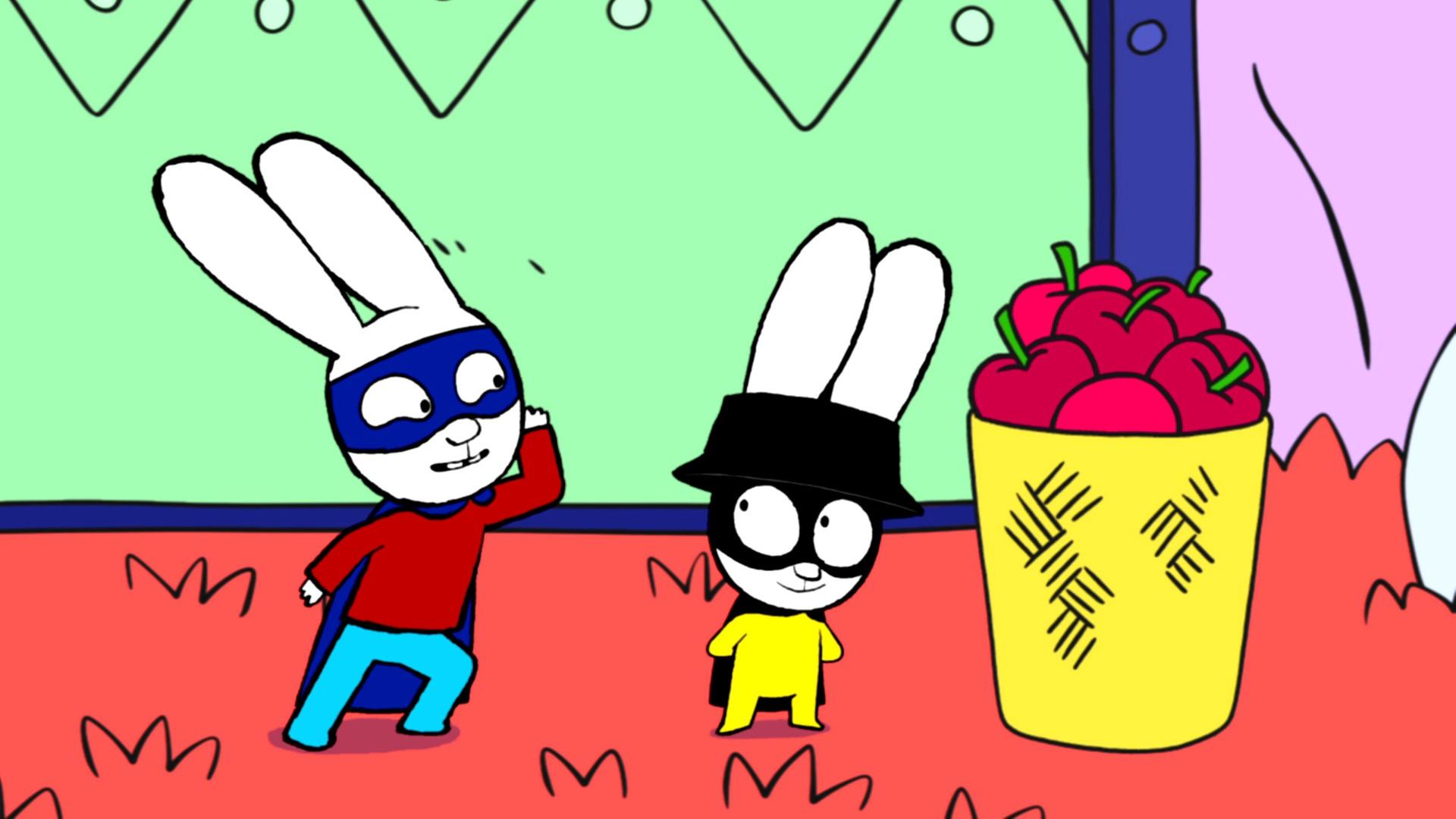 Superhase und Captain Hase stehen mit neugierigem Blick neben einem großen Korb mit Äpfeln. Beide schauen sich freudig an.