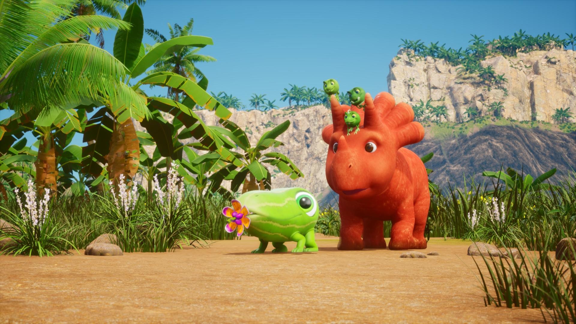 Eine kleine Gurke mit großen Augen und vier Füßchen - ein sogenanntes Gurkodil - hat einen bunten Blumenschnuller im Mund. Hinter ihm läuft Ginger, ein Saurier der aussieht wie eine Karotte mit Gesicht. Sie laufen am Strand, im Hintergrund stehen Palmen und Gräser.