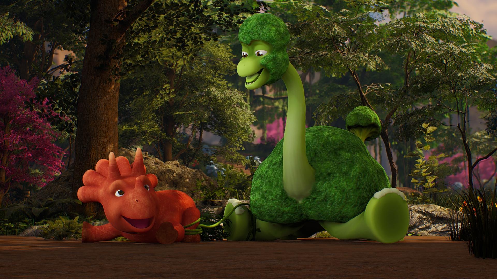 Im Bild liegen - die Beine von sich gestreckt - das Trikarottops-Mädchen Ginger und ein Brokkolisaurier nebeneinander. Sie sind mit einem grünen Seil zusammengeknotet an den Beinen. Sie lachen sich gegenseitig an. (Ginger ist ein Wesen, das einer Karotte ähnelt und ein Brokkolisaurier schaut wie ein grüner Brokkoli aus.)