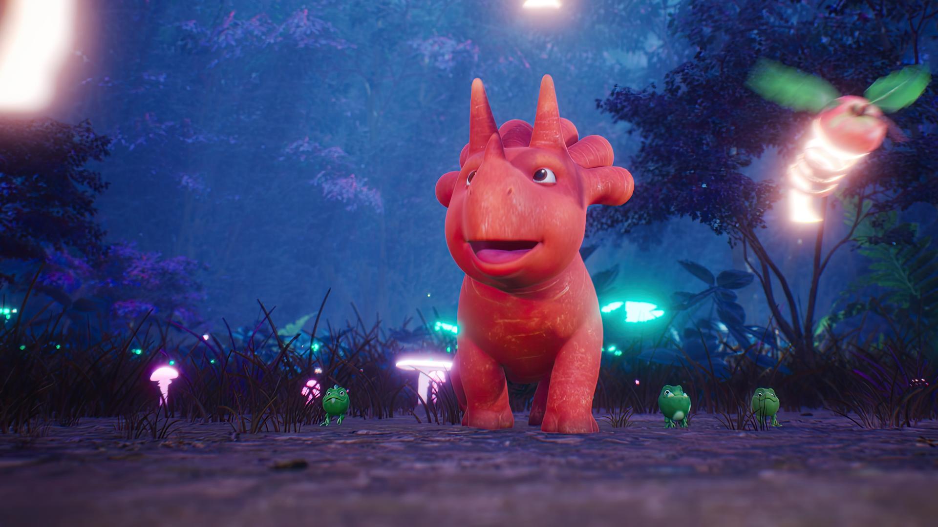 Ginger, das orangefarbene Trikarottops-Mädchen, steht in der Bildmitte und blickt erfreut nach oben. Denn dort schwirren leuchtende Äpfel mit Flügeln - die sogenannten Apfelfliegus. Um sie herum ist ein dunkler, bläulicher Wald mit einigen kleinen Leuchtpilzen.