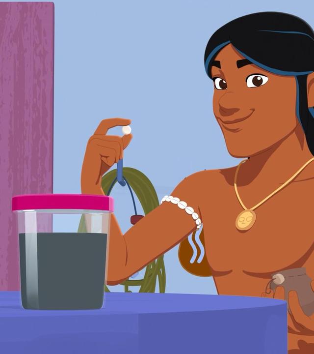 Auru steht vor einem Gebäude an einem hohen Tisch auf dem ein Gefäß mit dunkler Flüssigkeit steht. Auru hält mit der rechten Hand eine weiße Perle hoch und schaut mit einem Lächeln auf das Gefäß.