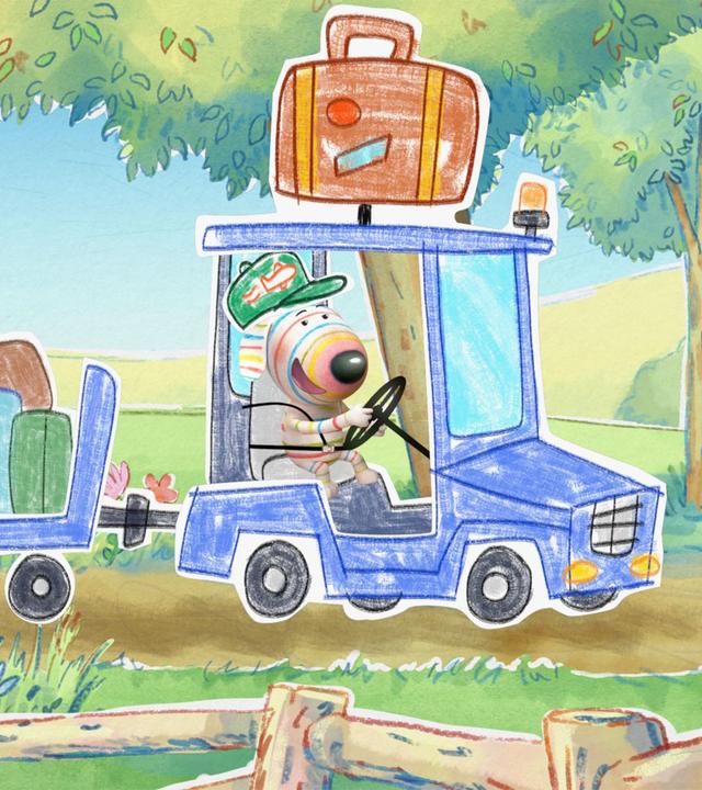 Hund Dylan fährt mit einem kleinen Caddy – einem offenen Gepäckwagen – fröhlich einen Waldweg entlang. Auf dem Wagen liegt das bunte Gepäck der Fluggäste gestapelt. Dylan trägt eine Mütze und er lächelt zufrieden.