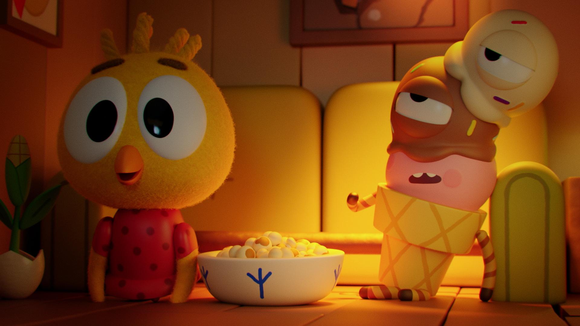 Das Küken Karla und Waffel, die Eiswaffel, sitzen nebeneinander auf Karlas gelber Couch. Vor ihnen steht in der Mitte eine Schale mit Popcorn. Karla blickt konzentriert nach vorn, um Fernsehen zu schauen. Waffel wirkt erschöpft, die Augen sind leicht geschlossen. Die Eiskugeln, die seinen Kopf darstellen, beginnen zu schmelzen.