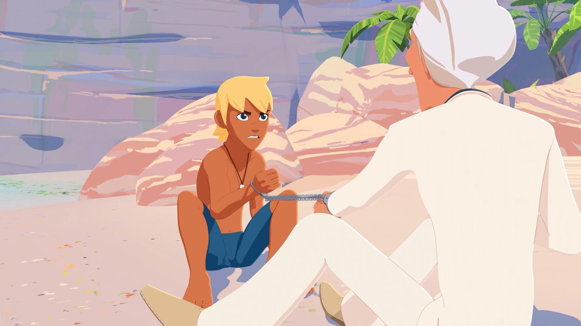 Yann und Van Krook sitzen am Strand einander gegenüber. Sie sind durch Handschellen aneinander festgebunden. Yann schaut Van Krook erbost an. Im Hintergrund sind einige Felsen zu sehen.