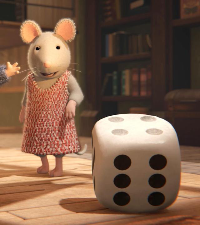 Sam und Julia stehen im Treppenhaus des Mäusehauses und lassen dort voller Spannung einen großen Würfel rollen. Wir sehen die Seiten mit sechs und vier Punkten.