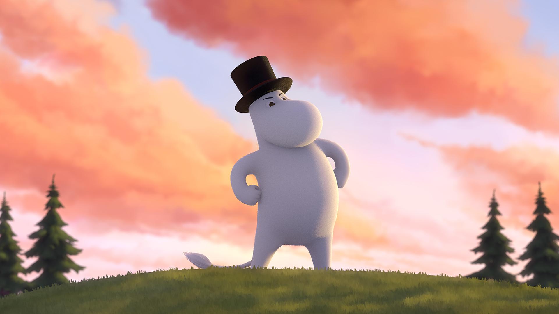 Muminpapa steht auf einem Hügel und hat die Arme in die Hüfte gestemmt. Er hat einen sehr entschlossenen Gesichtsausdruck. Hinter ihm leuchtet der Himmel in hellblau und rosa.