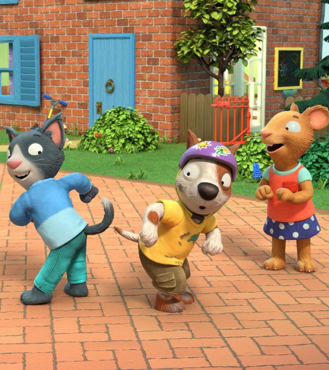 Draußen auf dem gepflasterten Weg vor dem Haus stehen Zac, der Hund und Mo der Kater in der Mitte, Rücken an Rücken und machen voller Freude den Popo-Wackel-Tanz. Sie strecken den Po dabei heraus und wackeln wild mit ihrem Hinterteil. Pip das Kaninchen und Posy die Maus stehen rechts und links von ihnen und blicken sich lachend an.