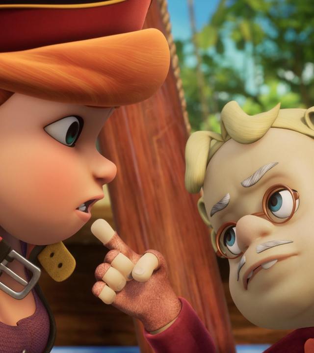 Käpt'n Raubein und der Inspekteur der Pirate Academy mit Brille und Bart stehen sich angespannt gegenüber. Mit dem Zeigefinger der rechten Hand zeigt der kleinere, blonde Inspekteur direkt auf Käpt'n Raubein.
