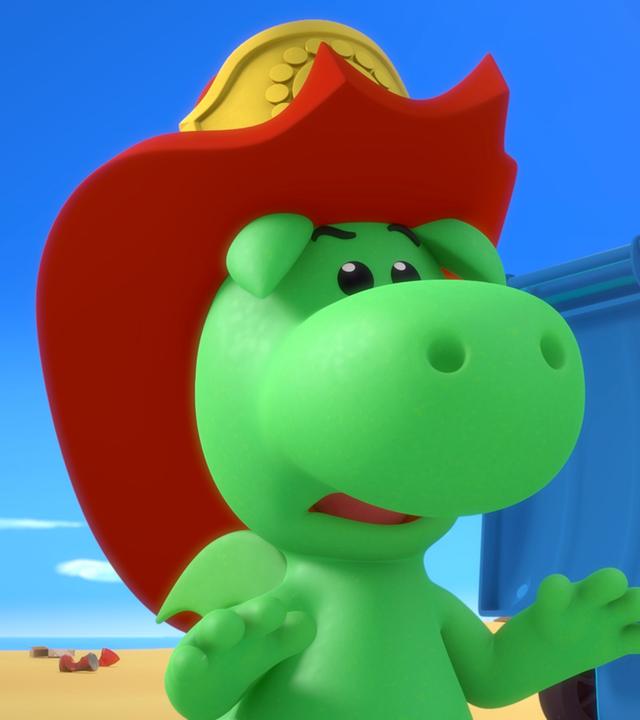 Drache Grisu trägt seinen roten Feuerwehrhelm. Stella hängt mit beiden Händen an einer großen, gelben Mülltonne. Ihre Beine baumeln in der Luft. Im Hintergrund sieht man Müll am Strand.