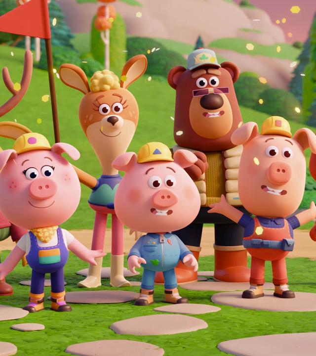 Fred, Dana, Bernhard, die Werkel-Ferkel und Cherry stehen im Bild. Sie werfen goldenes Konfetti in die Luft und halten Fähnchen in den Händen. Mit großen Gesten scheinen sie "Überraschung" zu rufen. Es ist schon Abend, der Himmel ist lilafarben.