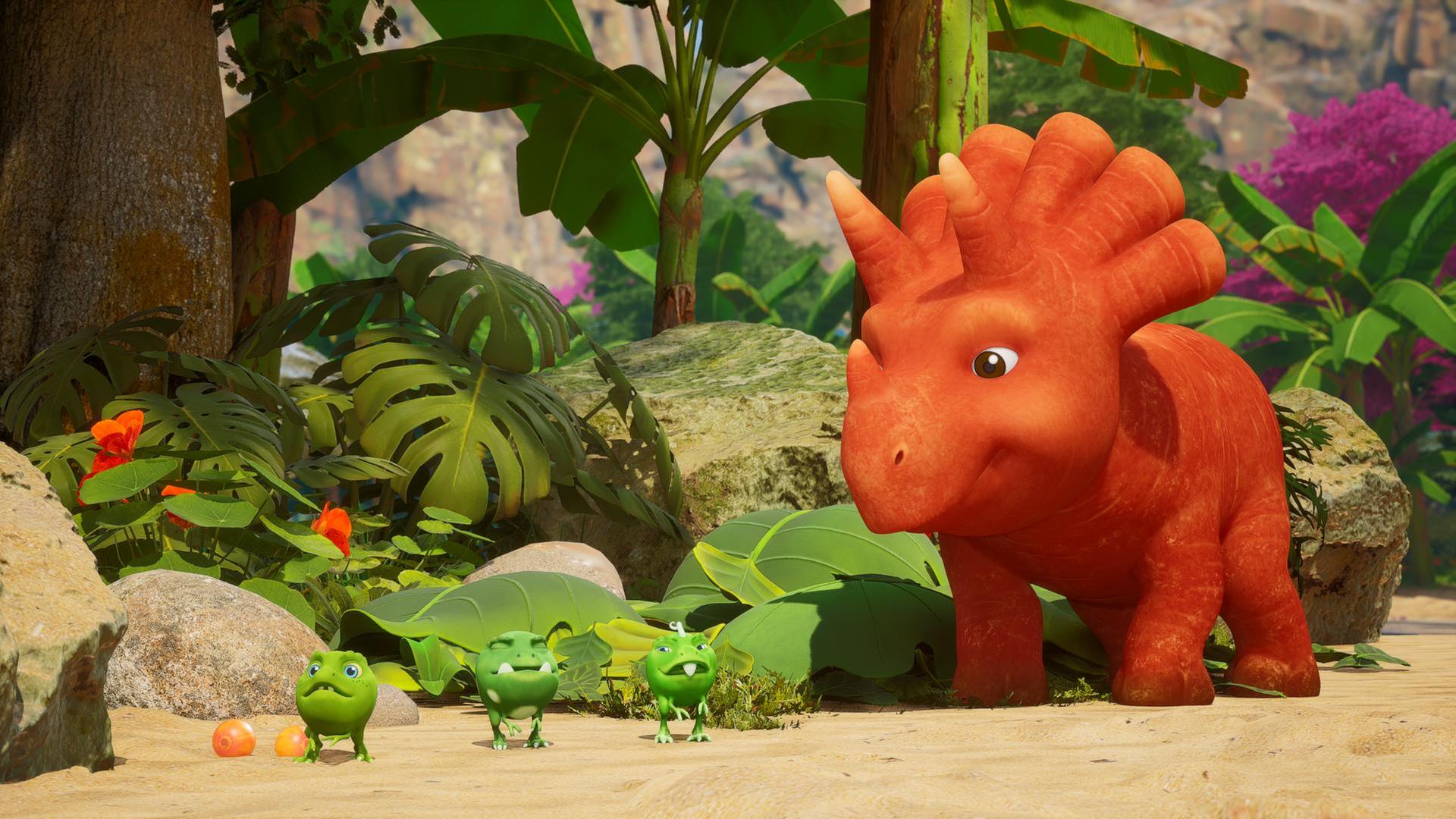 Das Trikarottops-Mädchen Ginger blickt auf die drei Erbs-Rexe, die vor ihr stehen. Die Erbs-Rexe scheinen zu schnuppern und sie verziehen ihre Erbsen-Gesichter. Im Hintergrund sehen wir Steine und Farn. (Ginger sieht aus wie eine Karotte mit Gesicht und Hörnern.)