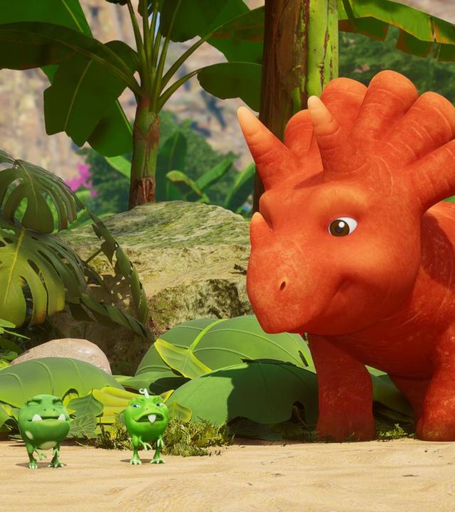 Das Trikarottops-Mädchen Ginger blickt auf die drei Erbs-Rexe, die vor ihr stehen. Die Erbs-Rexe scheinen zu schnuppern und sie verziehen ihre Erbsen-Gesichter. Im Hintergrund sehen wir Steine und Farn. (Ginger sieht aus wie eine Karotte mit Gesicht und Hörnern.)