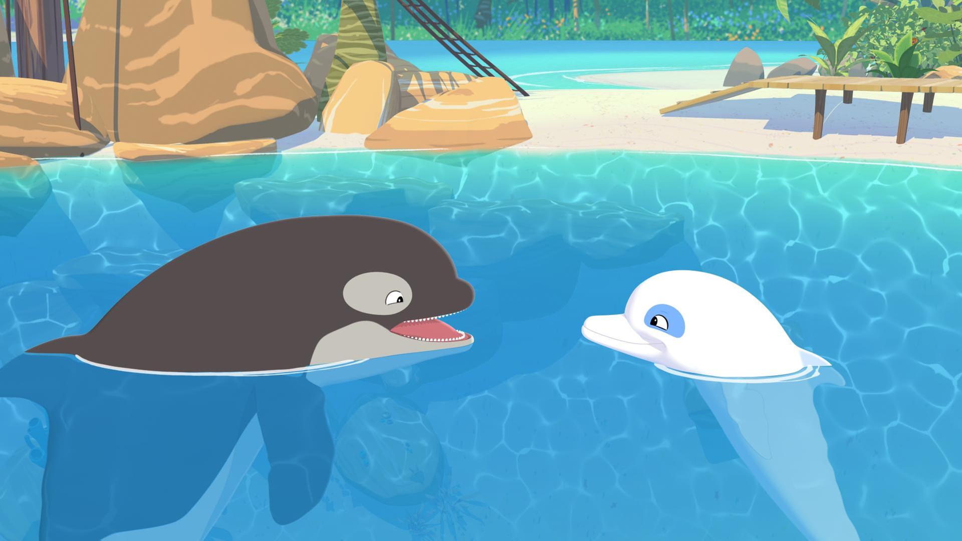 Orca-Wahl Billy schaut freudig mit offenem Maul zu Delfon Zoom herüber. Beide schwimmen in Meer, hinter ihnen ist der Strand der Insel zu sehen.