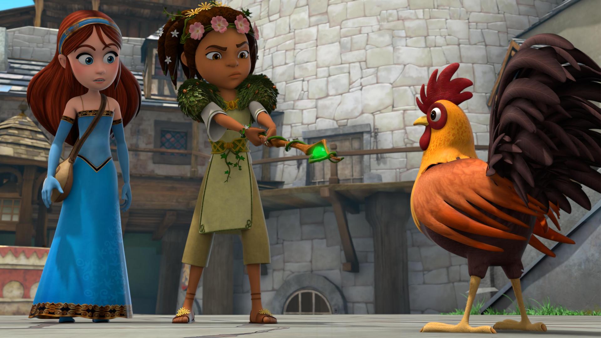 Im Schlosshof stehen Druidin Katell und Marian einem Gockel gegenüber. Marian blickt erwartungsvoll zu Katell, die mit konzentriertem Blick und auf den Gockel gerichtetem Druidenstab neben ihr steht. Der Stein in der Spitze des Stabs leuchtet grün.