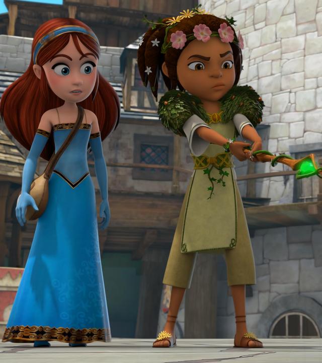 Im Schlosshof stehen Druidin Katell und Marian einem Gockel gegenüber. Marian blickt erwartungsvoll zu Katell, die mit konzentriertem Blick und auf den Gockel gerichtetem Druidenstab neben ihr steht. Der Stein in der Spitze des Stabs leuchtet grün.