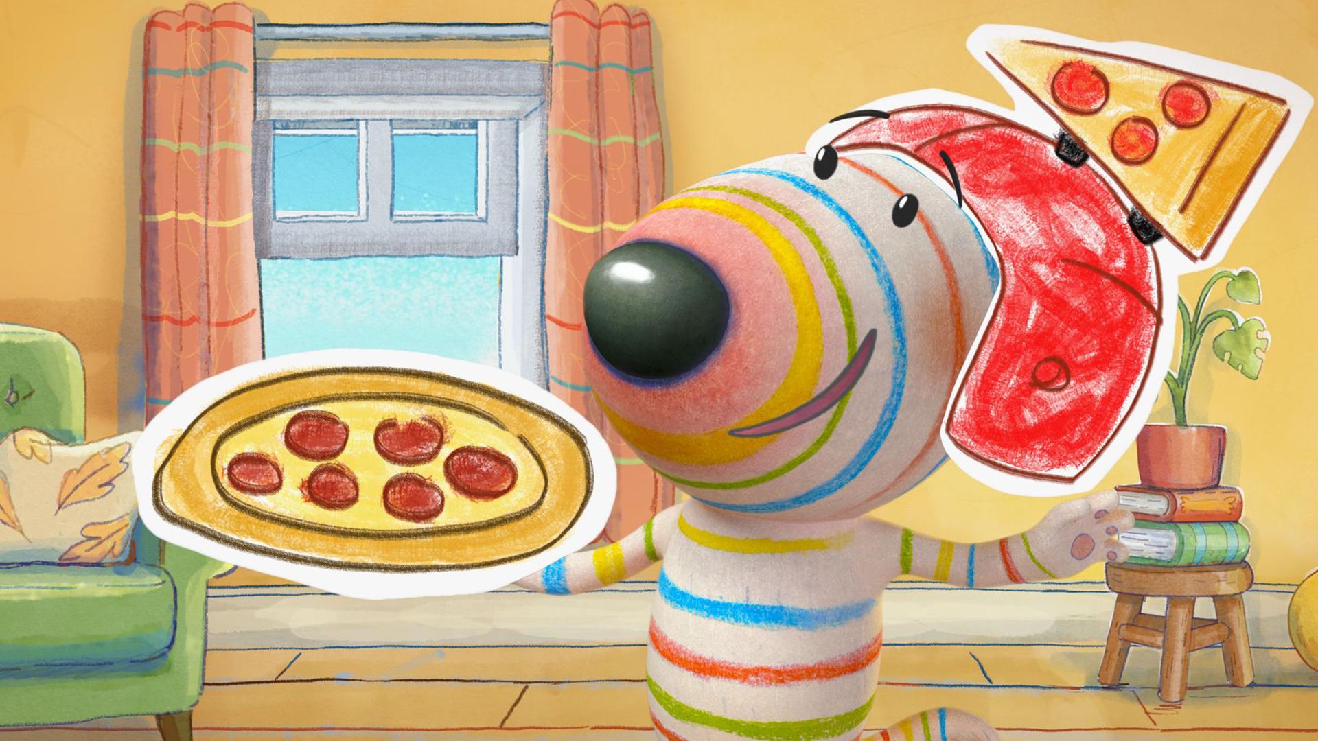 Dylan steht freudestrahlend in der Mitte seines Wohnzimmers. Auf dem Kopf trägt er einen Helm, auf dessen Spitze ein Stück Pizza befestigt ist. In einer Pfote balanciert er eine Salamipizza.