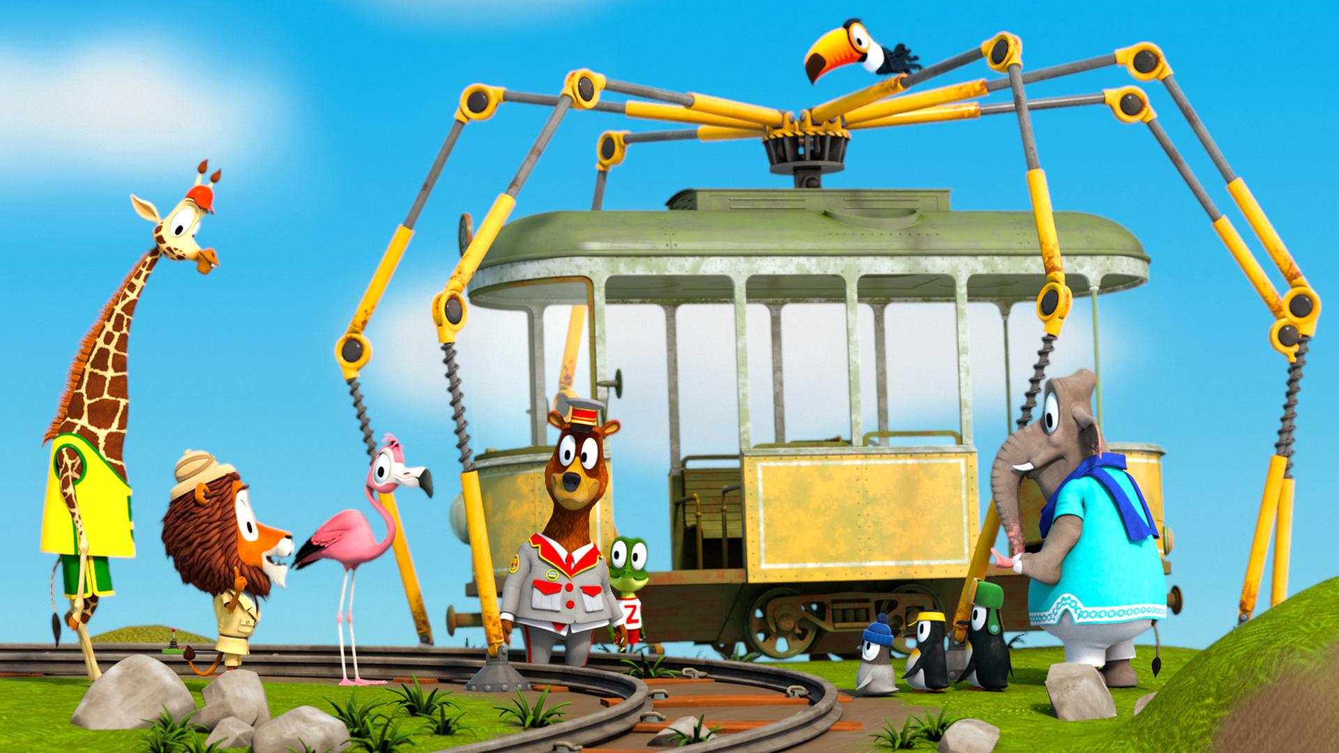 Alle Zootiere stehen um die Bahn herum und schauen zum Löwen Lionel..