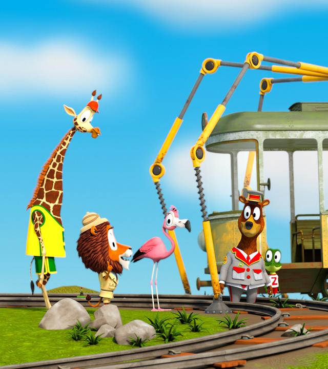 Alle Zootiere stehen um die Bahn herum und schauen zum Löwen Lionel..