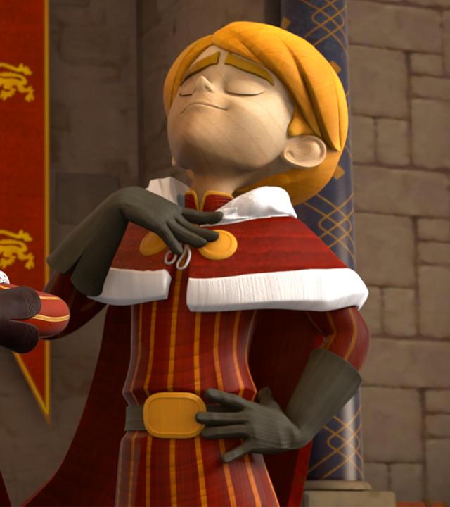 Im Schloss steht Prinz John mit stolz hervorgestreckter Brust und gerader Haltung vor seinem Thron. Er nimmt eine hoheitsvolle Geste an. Neben ihm steht eine lebensechte Statue von ihm.