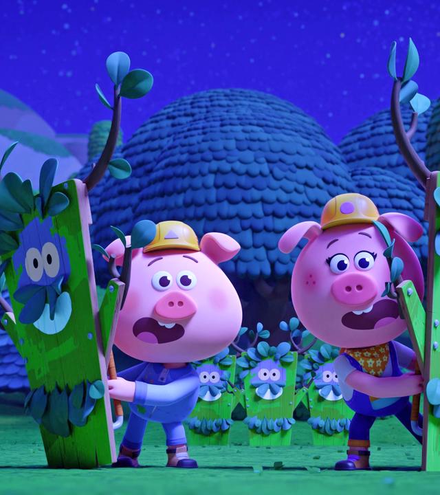 Zwei Werkel-Ferkel, nämlich Charlie und Cornelia, tragen bei Nacht zwei aus Holzplatten gebaute Figuren mit Gesicht und Hirschgeweih vor sich her. Sie machen erschreckte Gesichter.