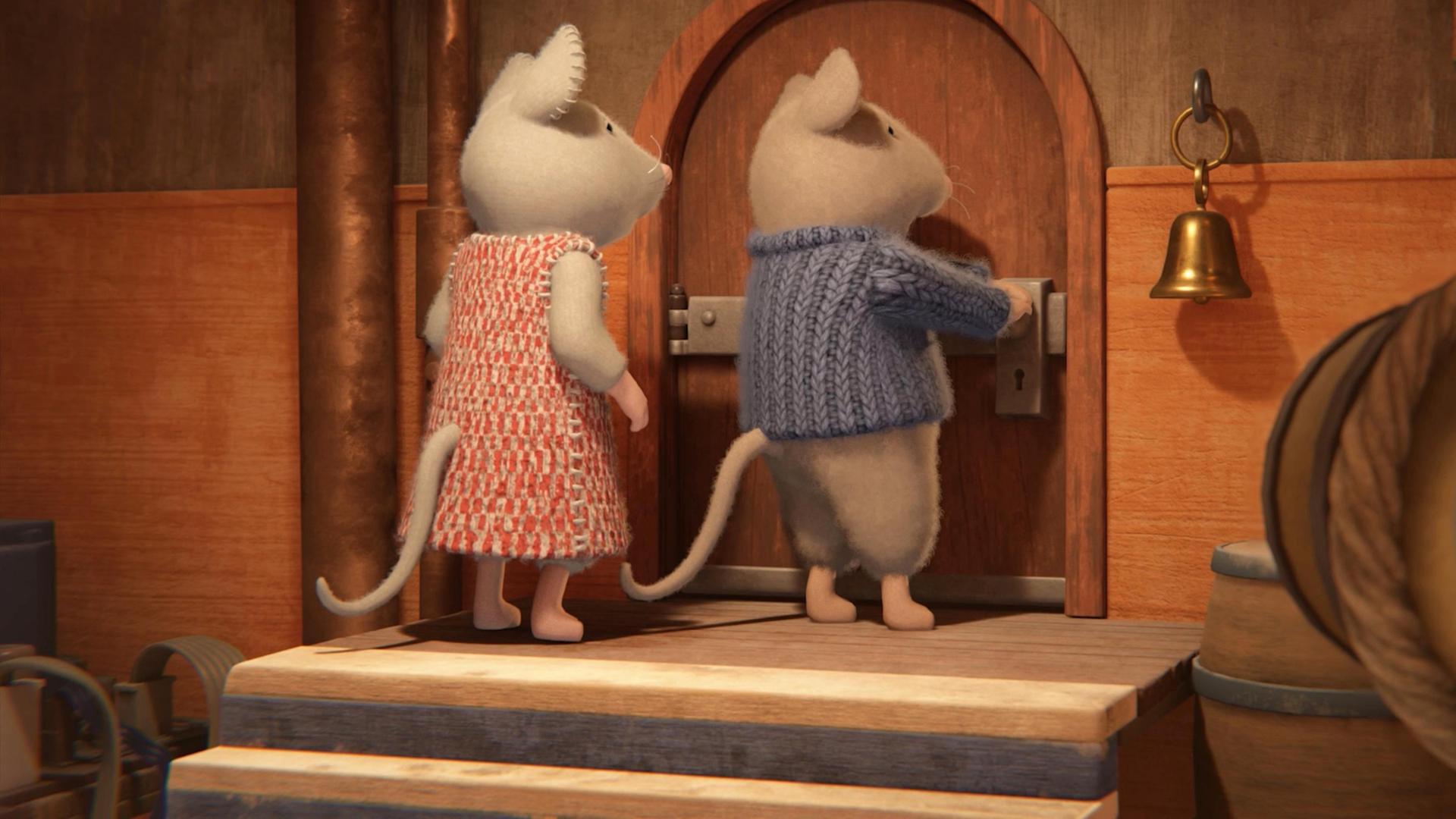 Julia und Sam stehen oben auf dem Treppenabsatz einer Treppe vor einer Tür mit Rundbogen. Sam versucht die Tür zu öffnen.  Beide stehen zur Tür gewandt und schauen besorgt auf das Schloss.