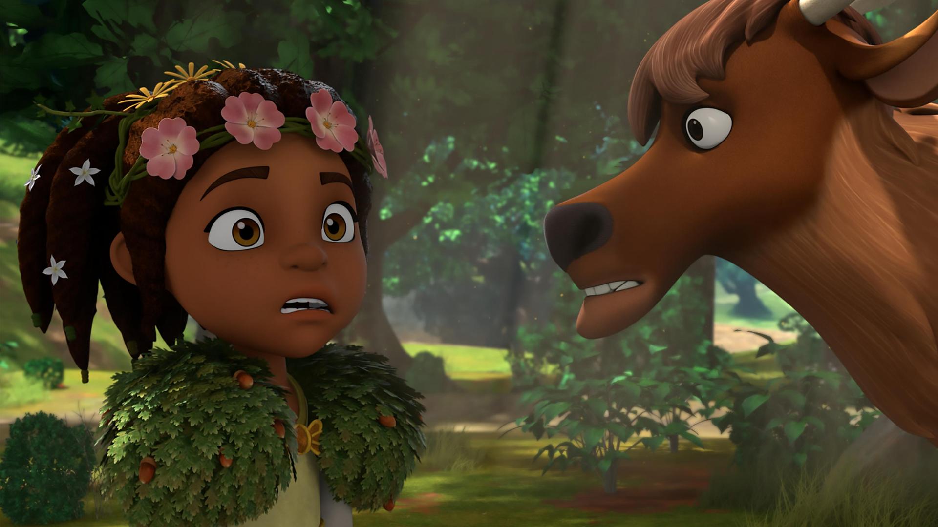 Die Druidin Katell steht vor einem Hirsch im Wald. Der Hirsch blickt sie an. Katell sieht entsetzt und alarmiert aus.