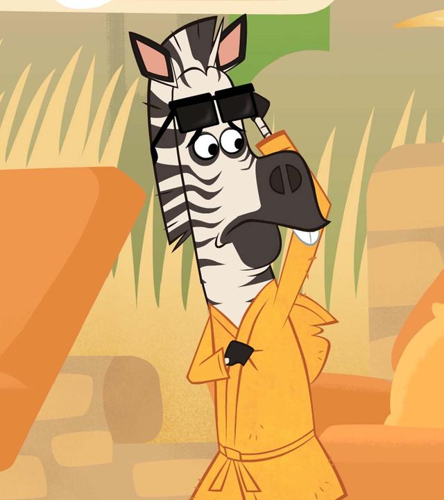 Das Zebra bittet Sherlock Yack und Hermione um Hilfe. Es wurde im Schlaf angepinselt. Es trägt einen Bademantel und eine Sonnenbrille, damit man das angepinselte Muster nicht sieht. Sherlock Yack und Hermione betrachten das Zebra mit verwundertem Blick.