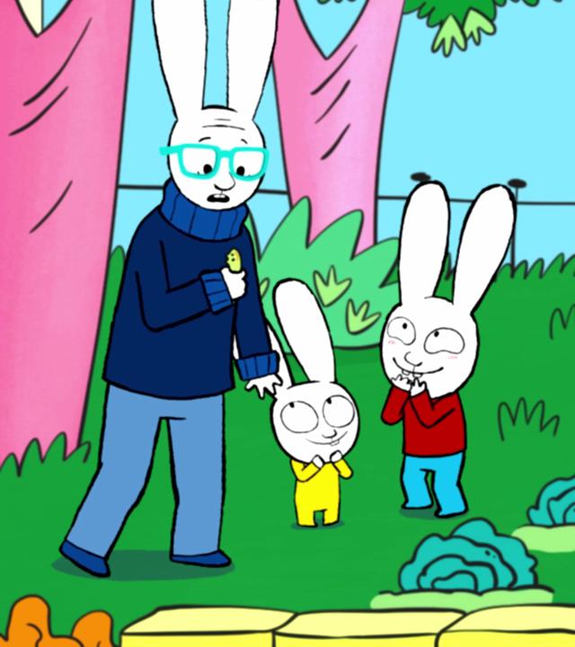 Simon und Franz stehen im Garten, in dem ein Salatbeet angepflanzt ist, und schauen kichernd zu Opa. Opa schaut überrascht in seine rechte Hand, in der er eine grüne Schnecke aus Knetgummi hält.