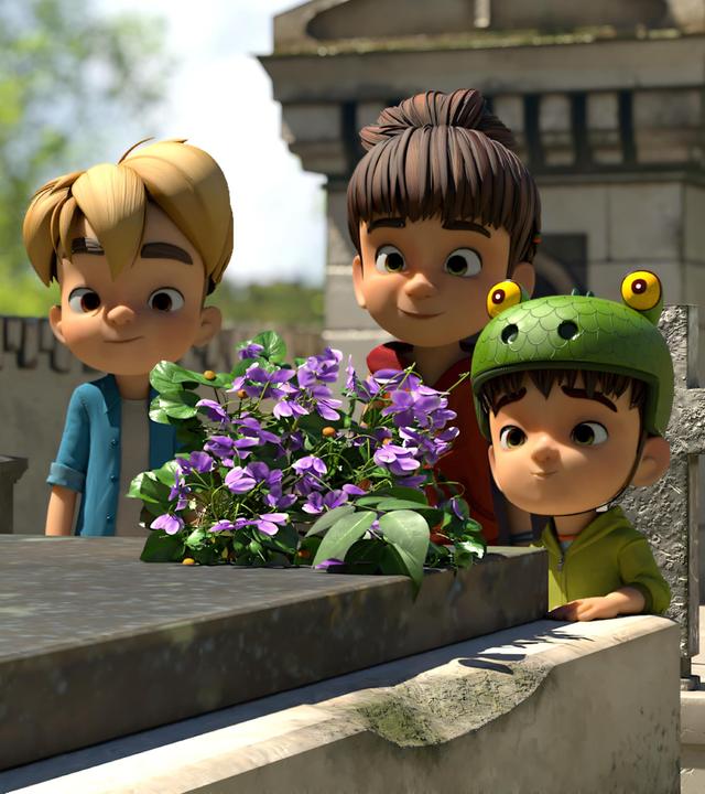 Tagsüber auf dem Friedhof machen die Kinder eine Entdeckung. Raphael, Bohnenstange und Kleiner Fuß stehen hinter einem Grab, das mit einer Steinplatte bedeckt ist und auf dem lilafarbene Blumen stehen. Sie blicken erstaunt und sichtlich gerührt auf etwas. Ihre Freundin Lina steht etwas weiter hinten und beobachtet die Szene auch gerührt. Sie lächelt.