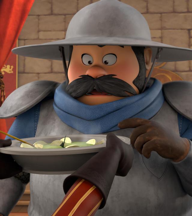 Im Schloss blickt der Sheriff etwas erstaunt auf den mit Essen gefüllten Teller, der ihm von Prinz John gereicht wird. Von Prinz John, der vor dem stehenden Sheriff sitzt, sind nur die behandschuhten Hände und Arme zu erkennen.