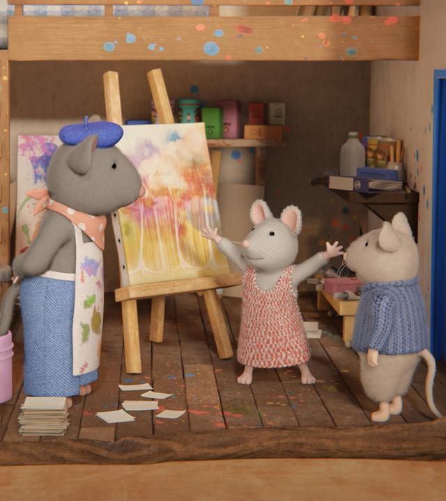 Im Atelier von Herrn Palett, dem Maler, steht Julia mit hoch erhobenen Armen und freut sich über ihre Idee. Sie will mit Sam ein Bild malen und es Ella schenken.