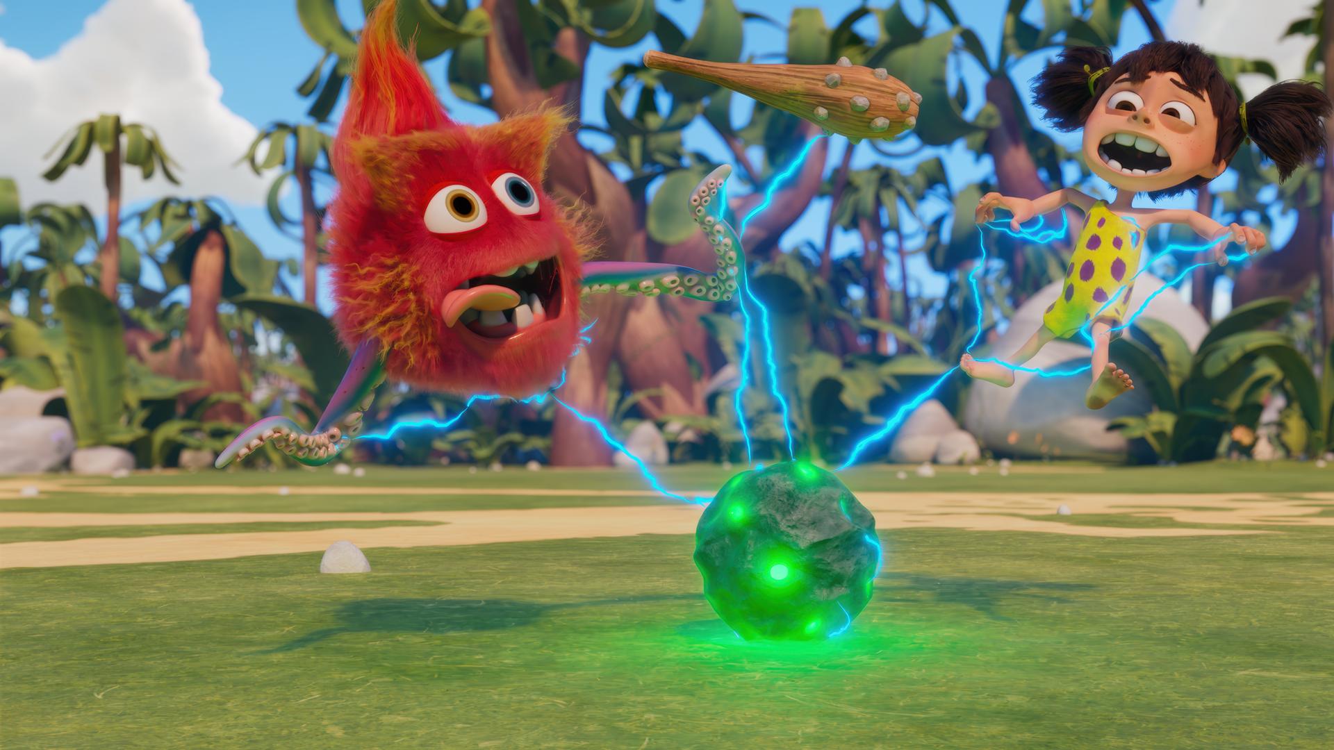 Ein grünlich schimmernder, runder Stein strahlt blaue Blitze ab. Durch diese Blitze zappeln Lucy, das Urzeitmädchen, und Proti, das rote Fellknäuel mit Augen, in der Luft herum. So, als würden sie aufgeladen. Beide schauen verängstigt.