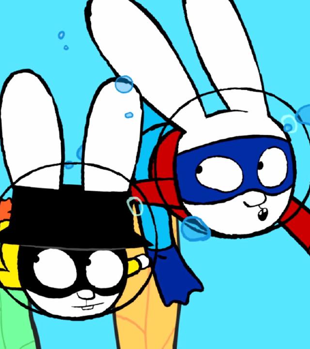 In der Fantasiewelt tauchen Captain Hase und Super Unterwasser. Beide tragen Taucherhelme auf dem Kopf und Schwimmflossen an den Füßen. Neben ihnen schwimmt eine große Qualle. Beide blicken wachsam zu der Qualle herüber.